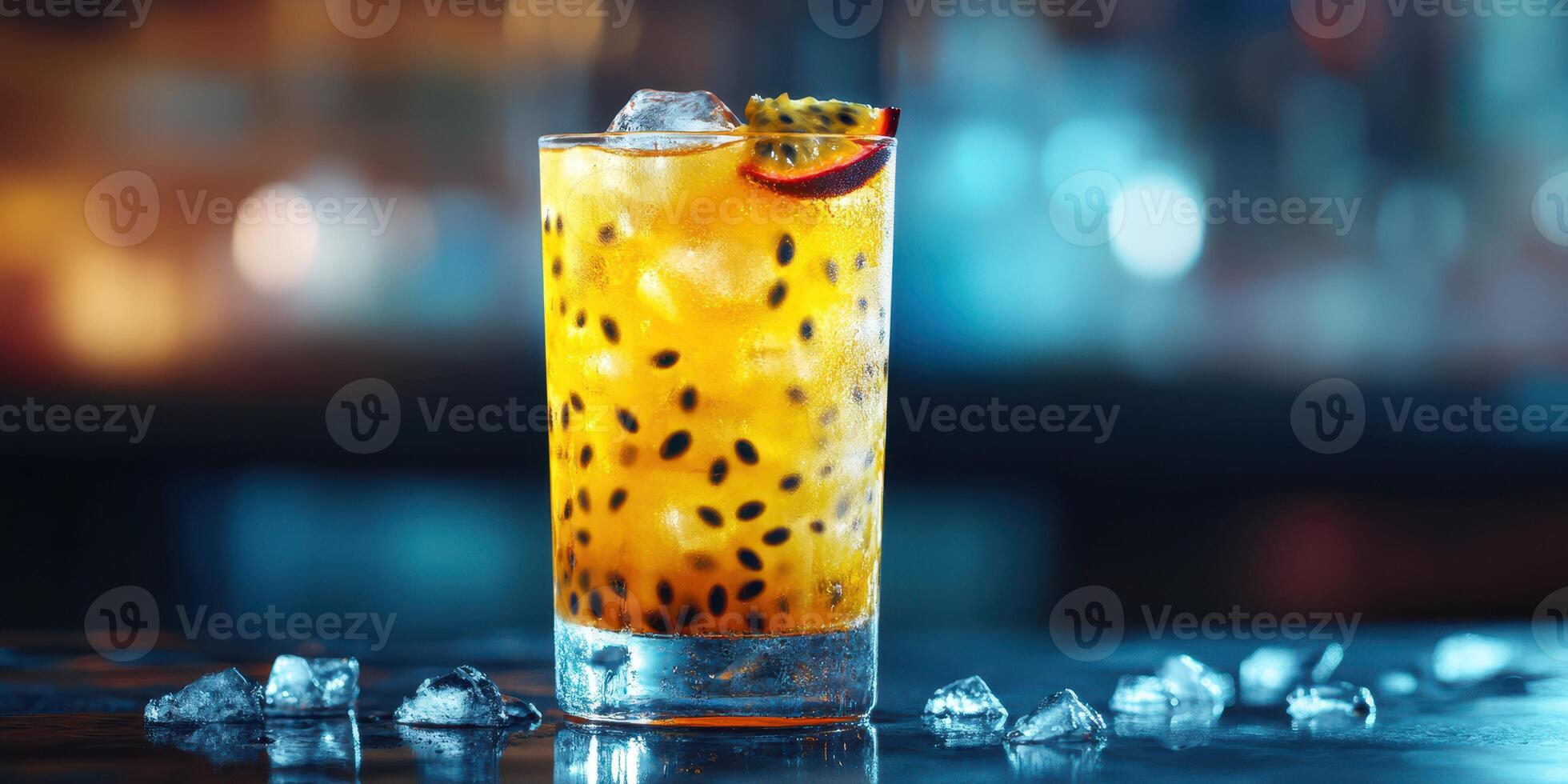 Colorful tropical cocktail served on a bar counter with ice in a vibrant setting at night photo