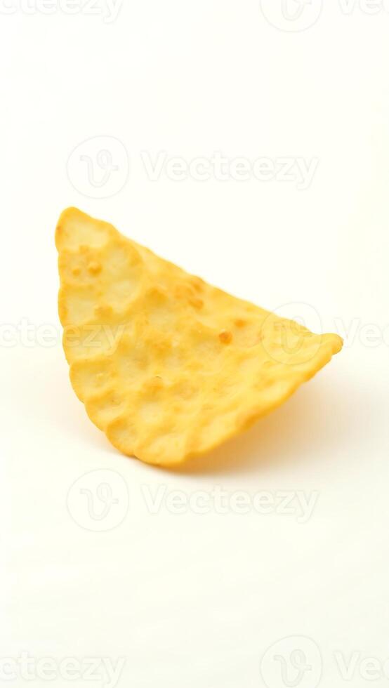 Extreme closeup of a crisp corn chip on a white background revealing texture details photo