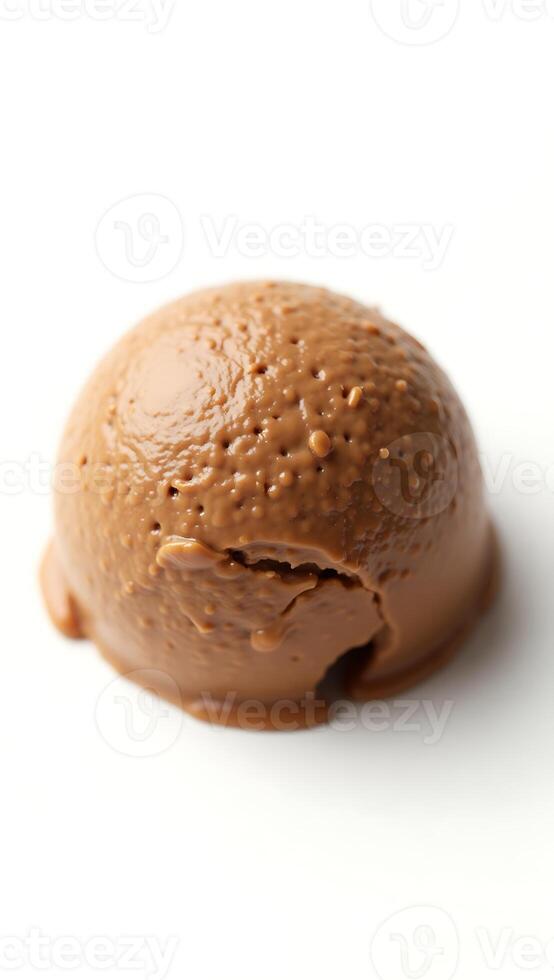 Extreme closeup of a smooth chocolate ice cream scoop melting slightly on a surface photo