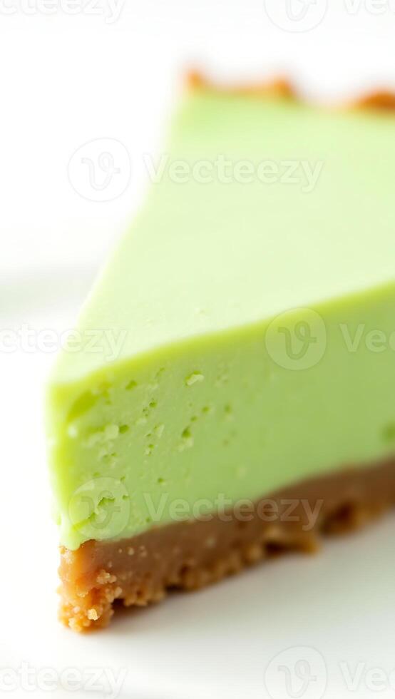 Closeup view of a slice of green dessert with a golden crust on a plate photo