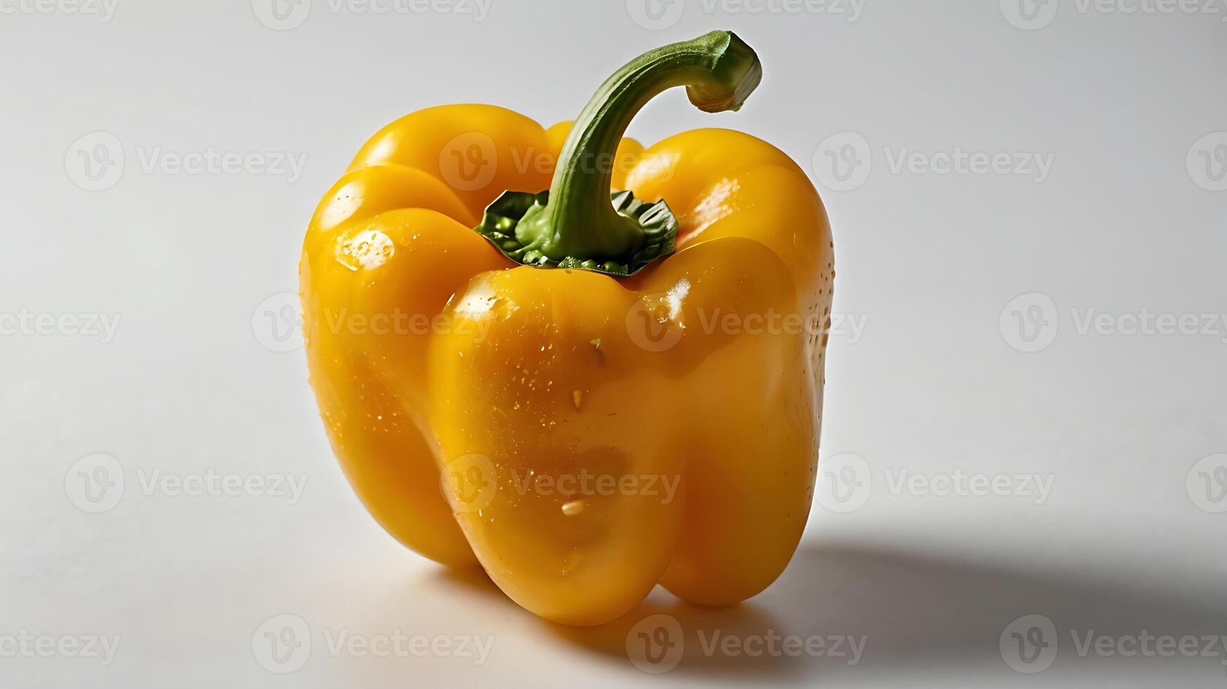 Closeup view of a fresh yellow bell pepper showcasing its texture and details photo