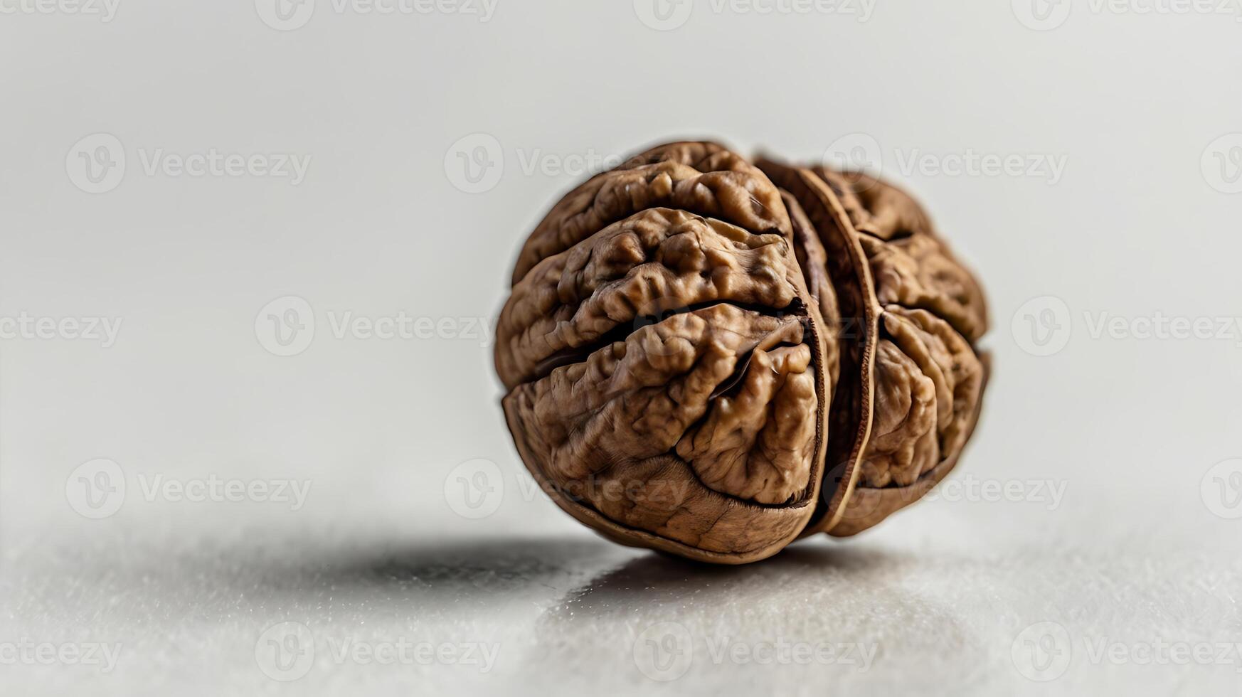 Extreme closeup of a walnut half showcasing its intricate texture and details photo