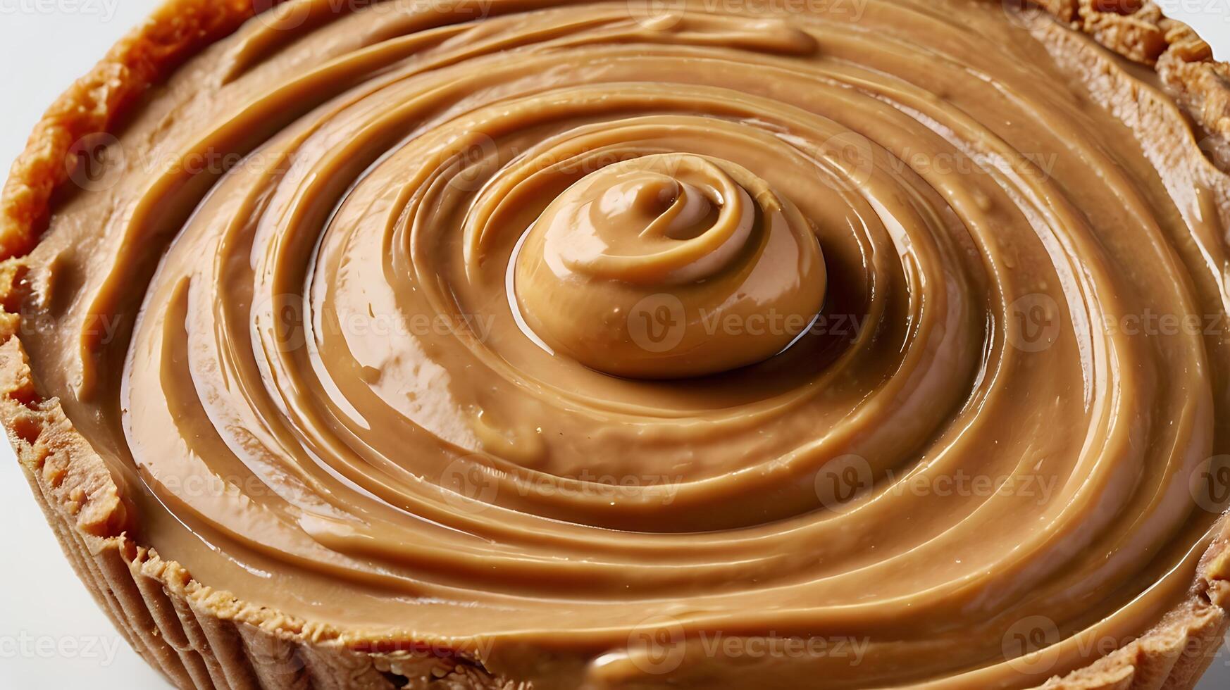 Closeup view of creamy peanut butter in a cookie crust pie shell photo