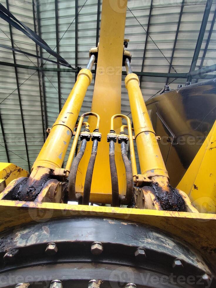 Close-Up of Excavator Engine Components and Hydraulic System photo