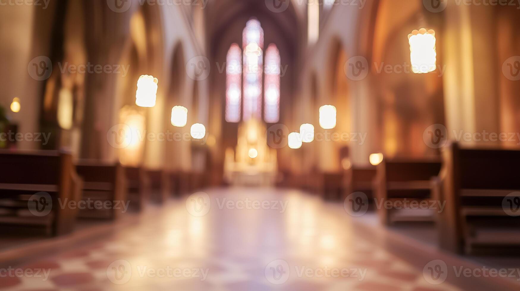 Blurred image of a church with pews and stained glass windows photo