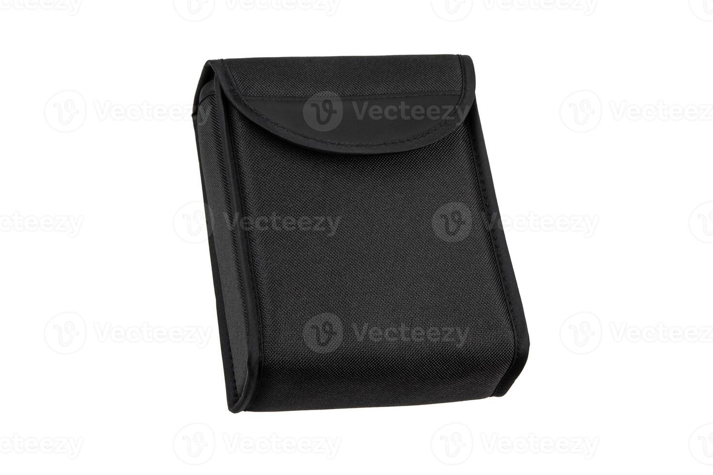 A black, rectangular, fabric pouch with a flap closure, suitable for storing small items or devices, isolated on a white back photo