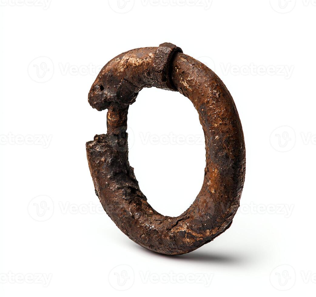A close-up of a vintage metal ring, showcasing its rusty texture and historical character. Ideal for themes related to industry, craftsmanship, and the passage of time. photo