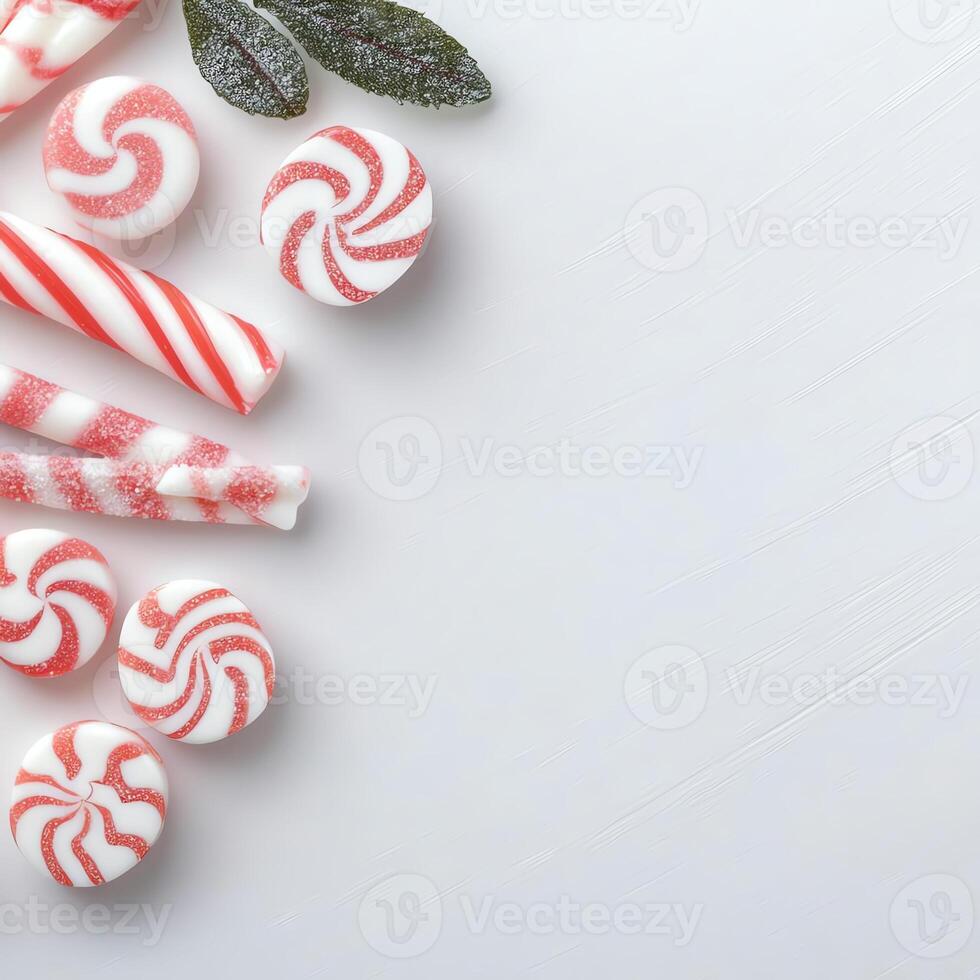 An assortment of festive peppermint candies arranged artistically on a white background, evoking holiday spirit and sweetness for seasonal celebrations. photo