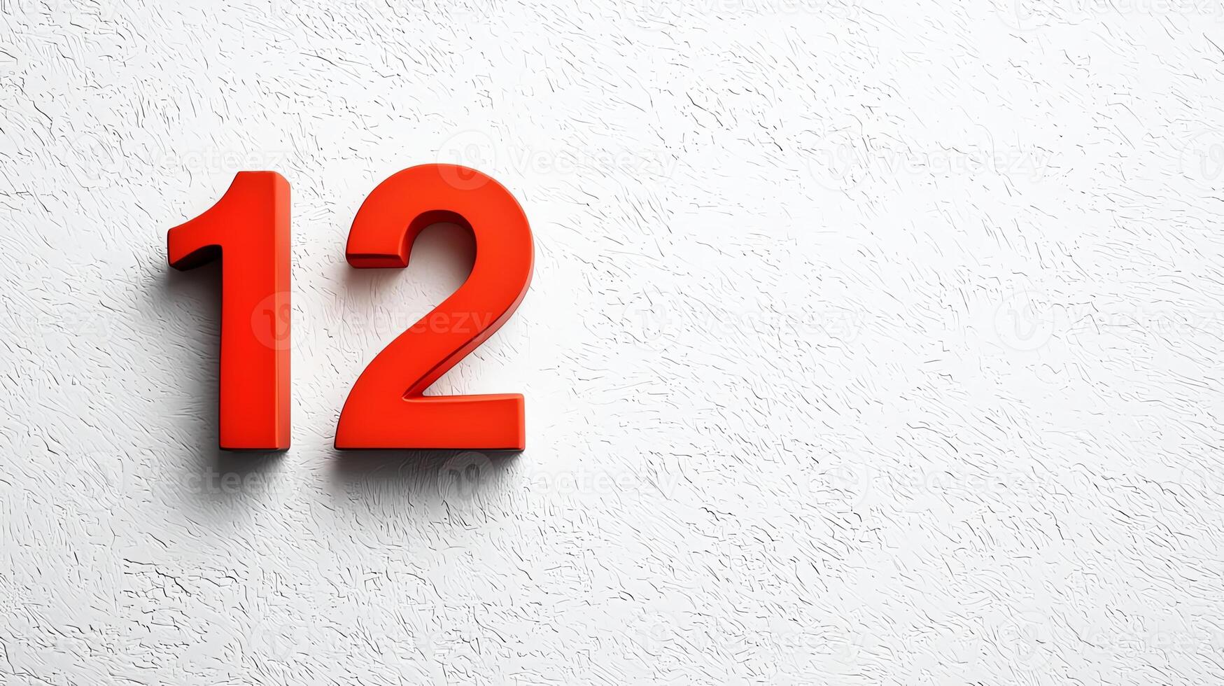 A close-up view of a bold red number twelve, elegantly designed against a textured white background, perfect for showcasing significance and emphasizing numerical value. photo