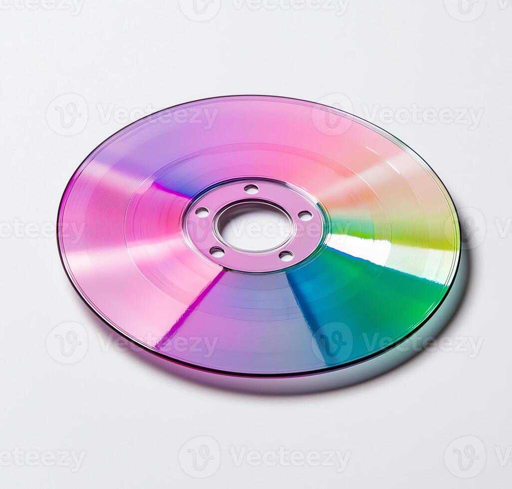 A colorful optical disc reflecting a spectrum of light, symbolizing digital data and modern technology. Perfect for illustrating concepts related to media and information storage. photo