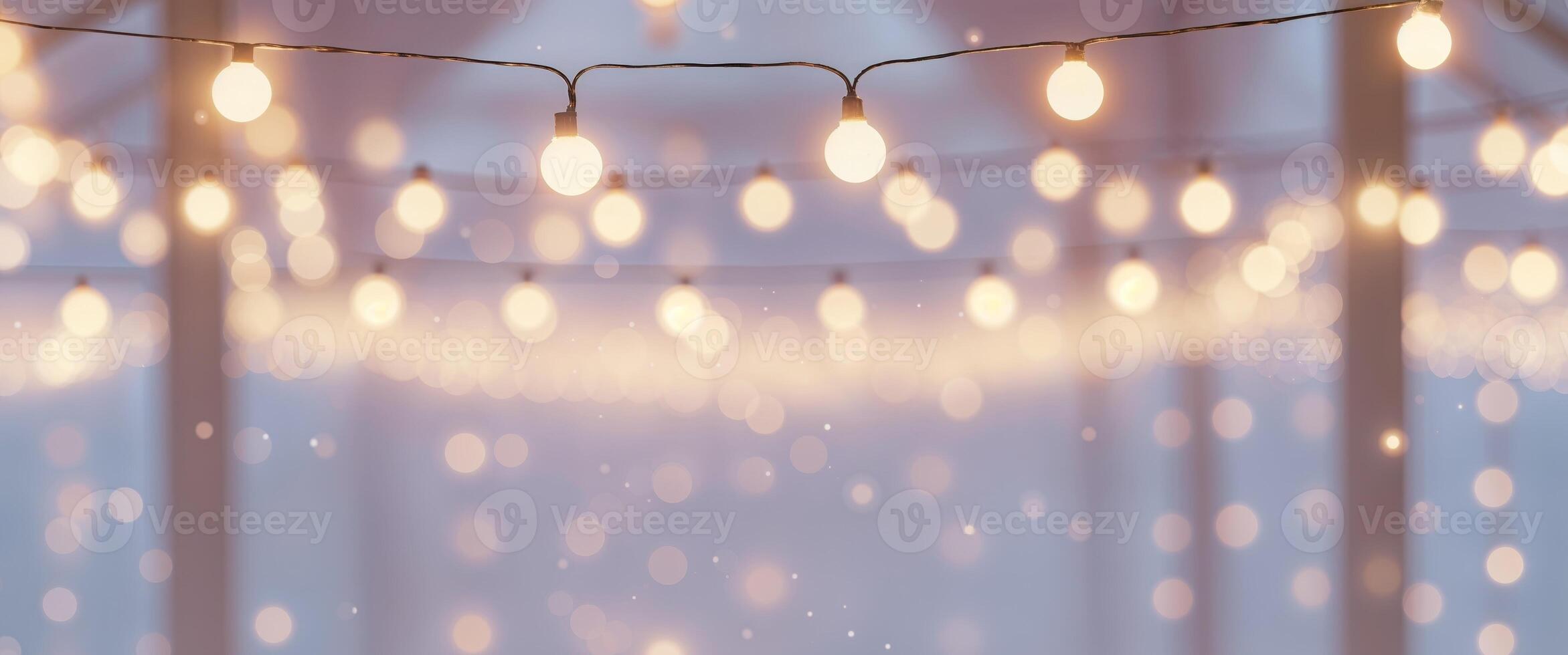A string of lights hanging from a ceiling photo