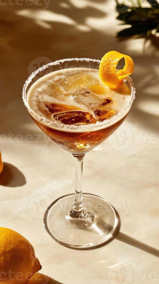 Enjoying a limoncello lemon drop martini with fresh lemon garnish on a sunny afternoon photo