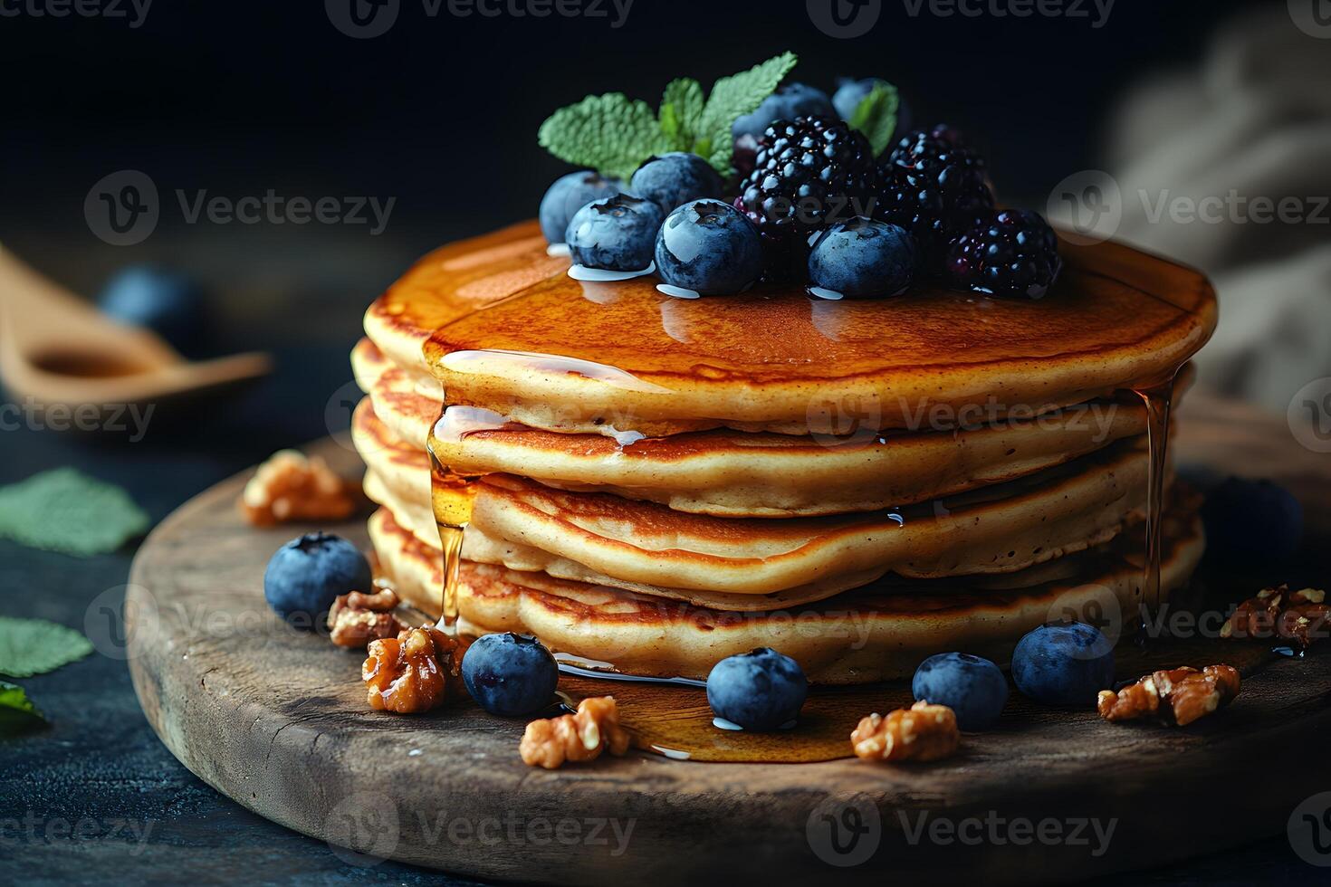 Delicious Pancake Stack with Berries and Maple Syrup - Perfect Breakfast Concept photo