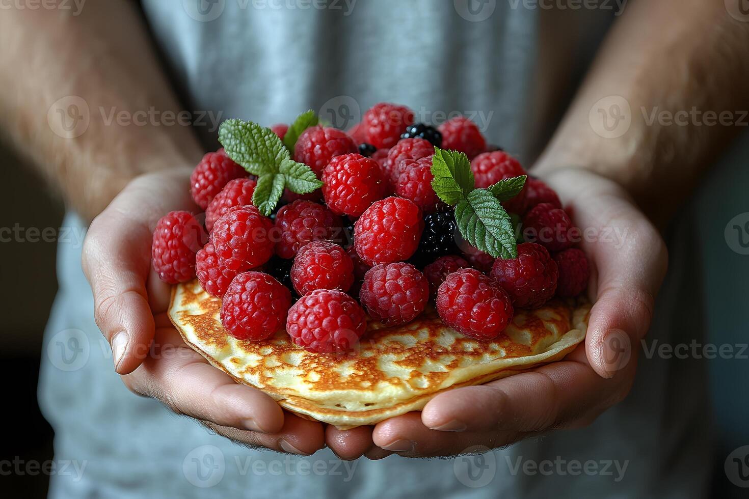 Fresh Pancake Topped with Berries and Mint for Breakfast Delight photo