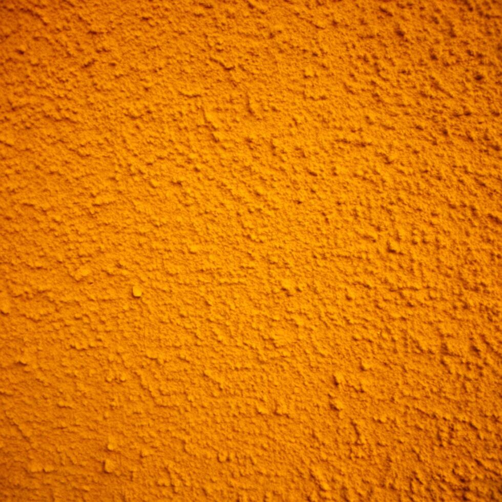 A Detailed Close Up View of a Deep Orange Textured Wall Surface photo