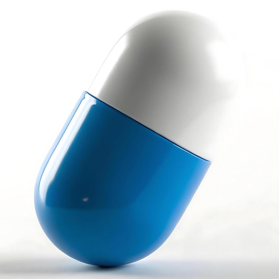 Closeup of a bright blue and white capsule medicine. photo