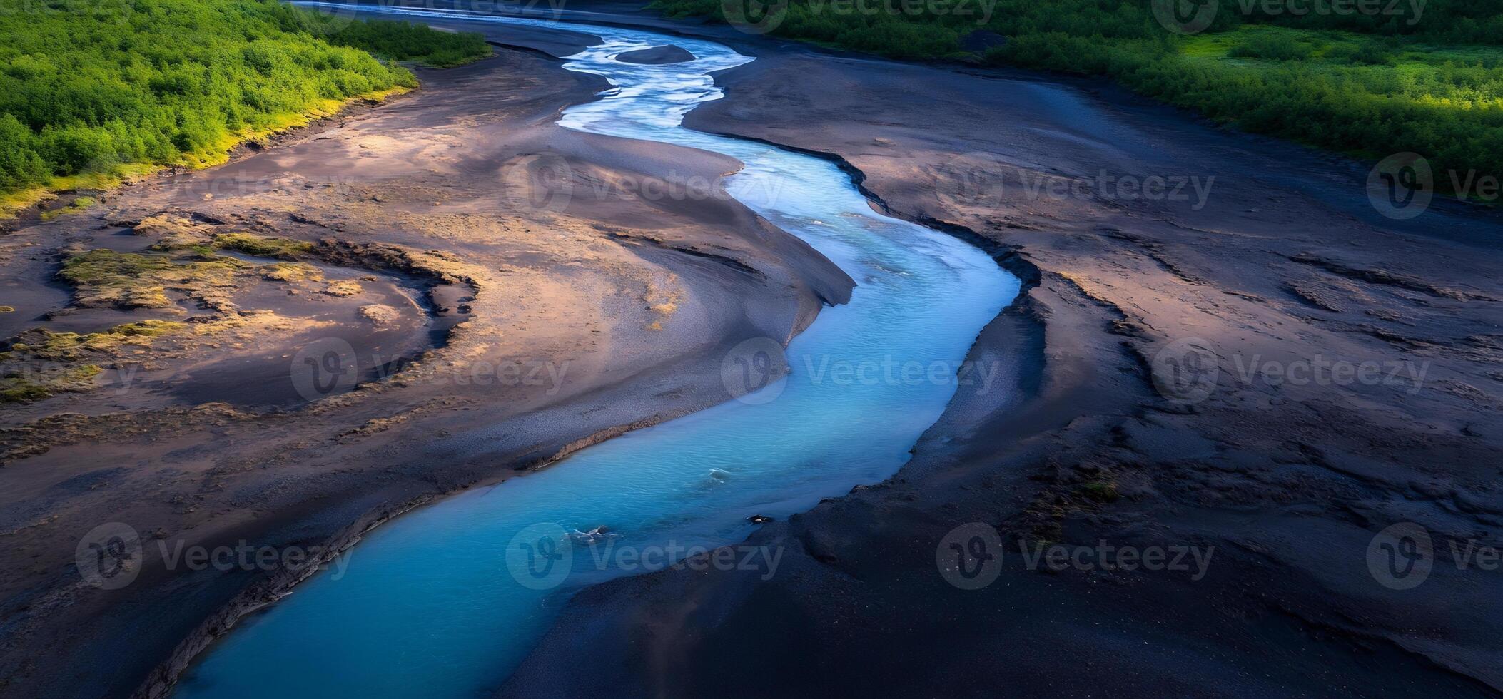 Winding River Through Volcanic Landscape photo