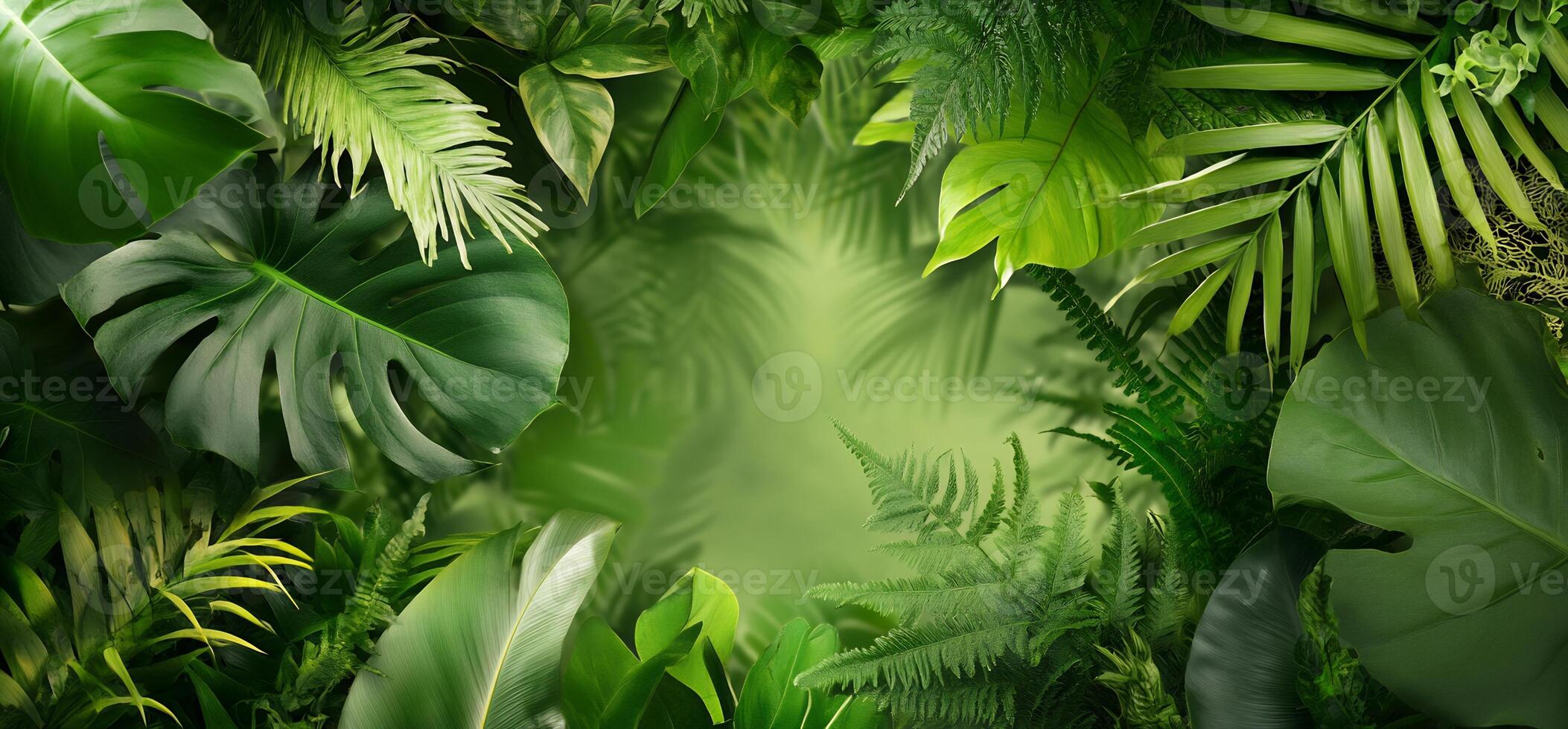 Tropical jungle background with green leaves photo
