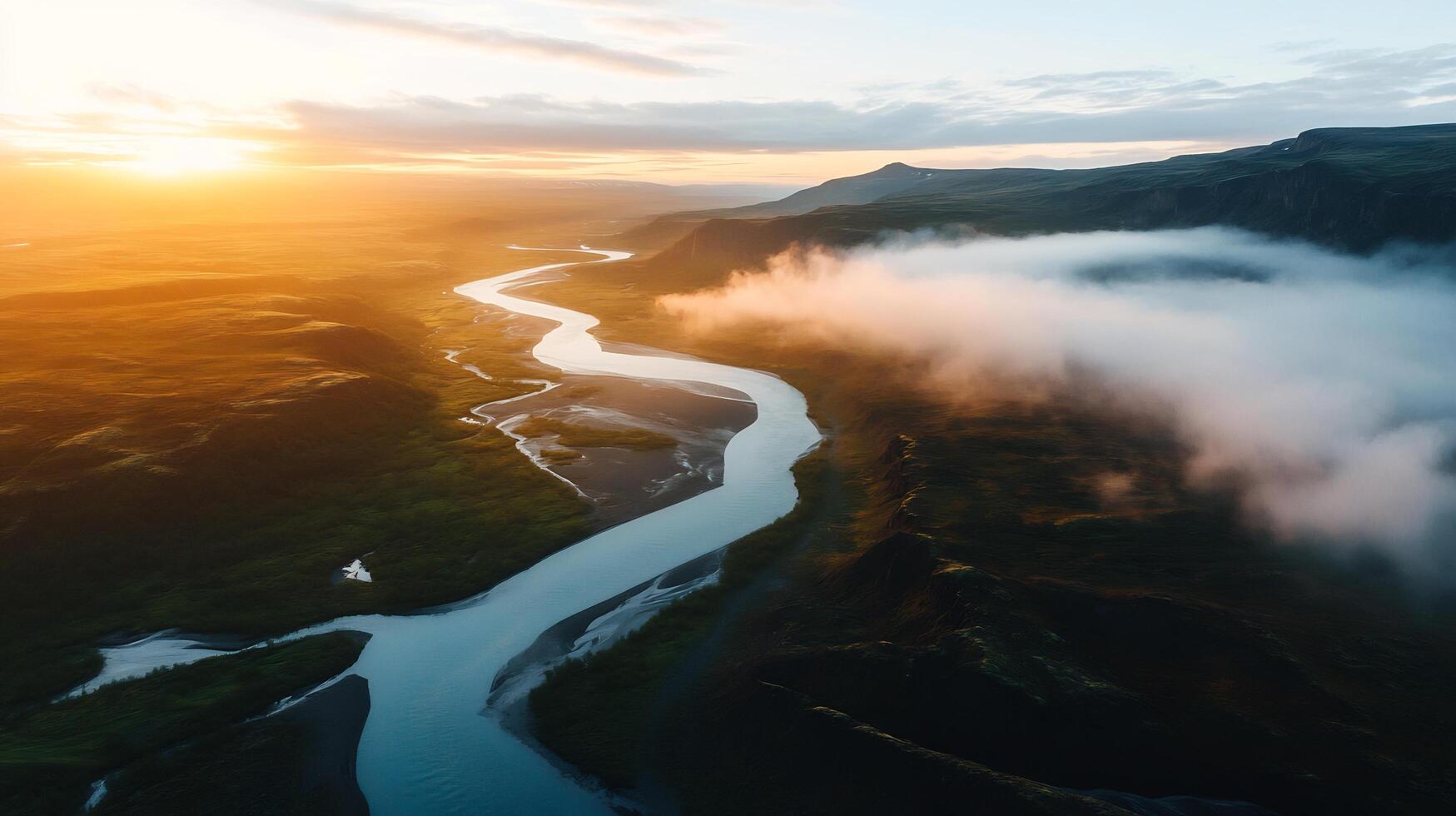 Aerial view of a winding river at sunset, mist in valley. photo