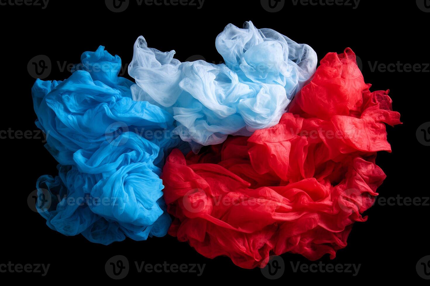 A red, white and blue cloth on a black background photo