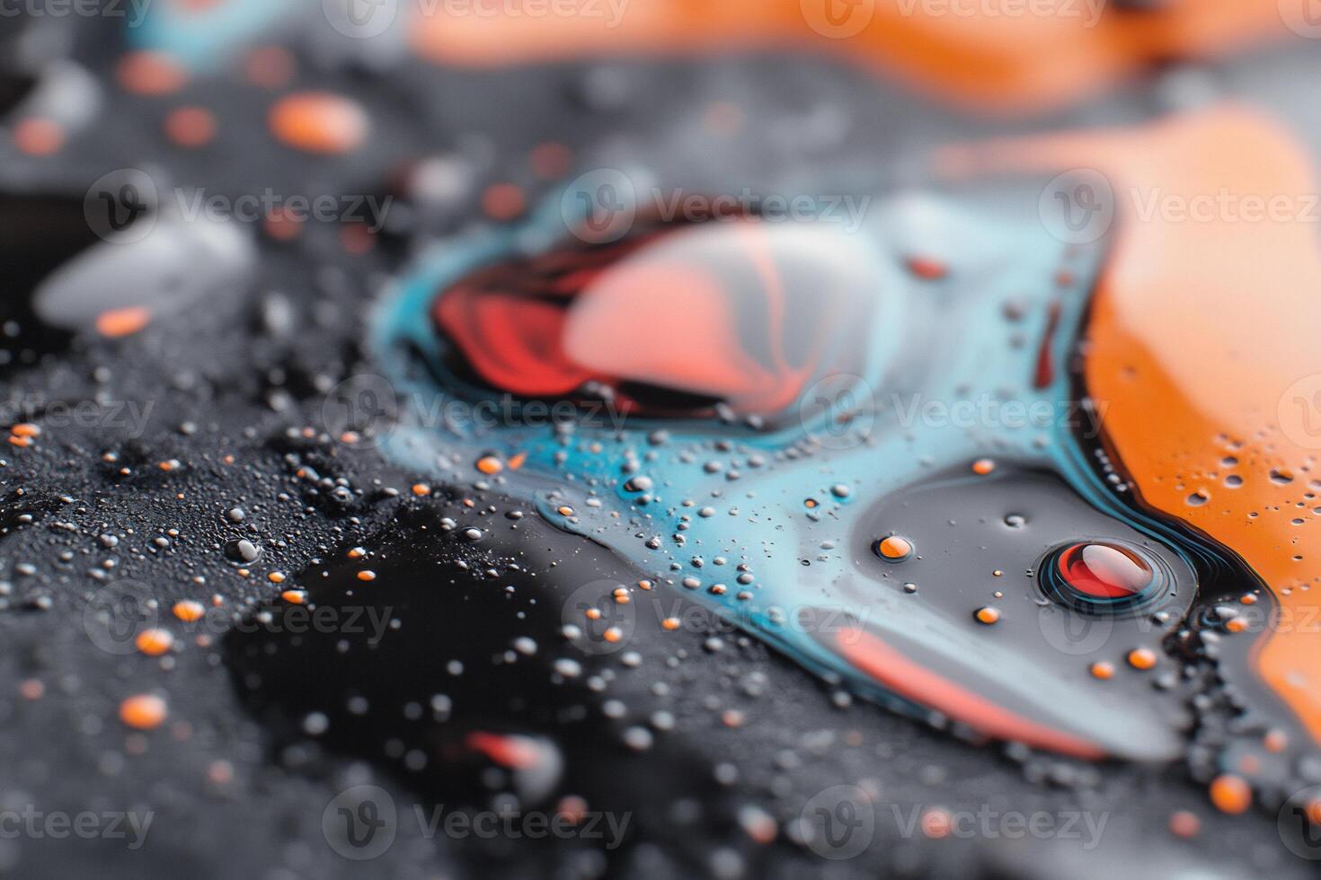 A close up of a colorful liquid with water droplets photo