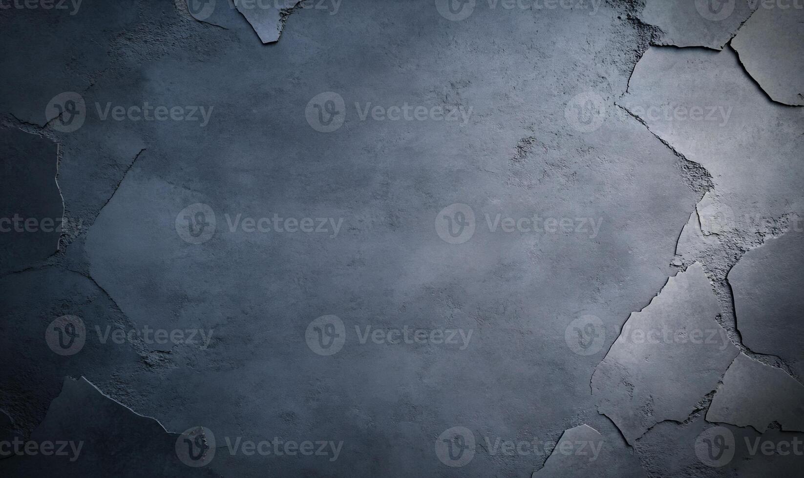 Dark gray textured concrete surface with cracks. photo