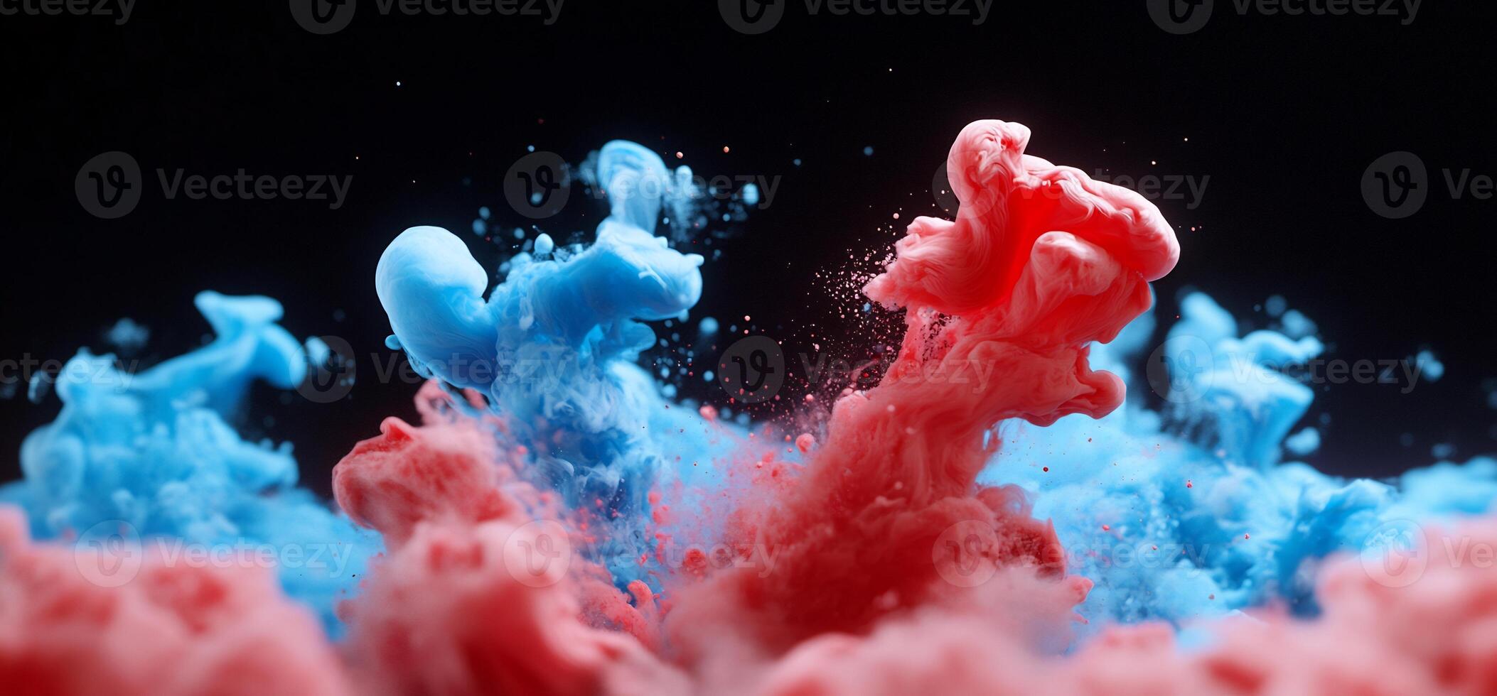 Blue and red ink in water on a black background photo