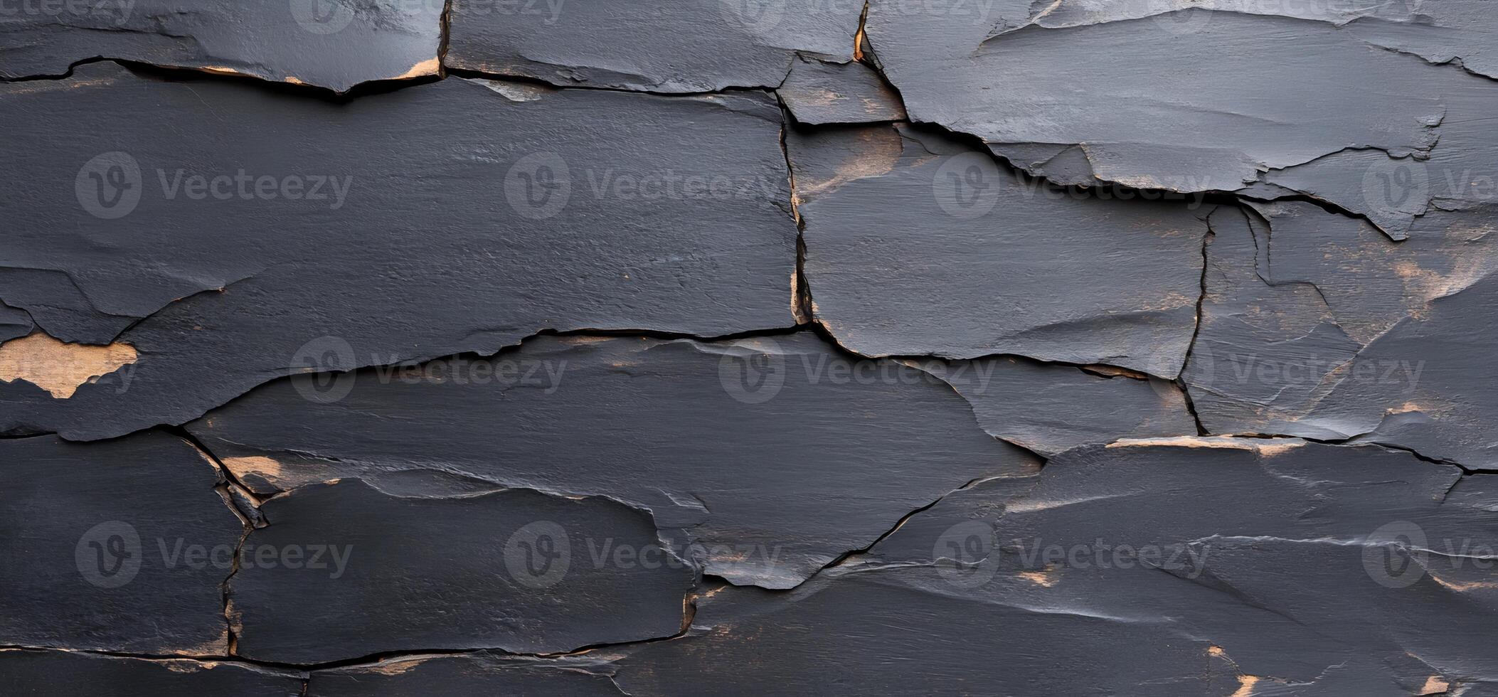 Dark gray cracked texture background. photo