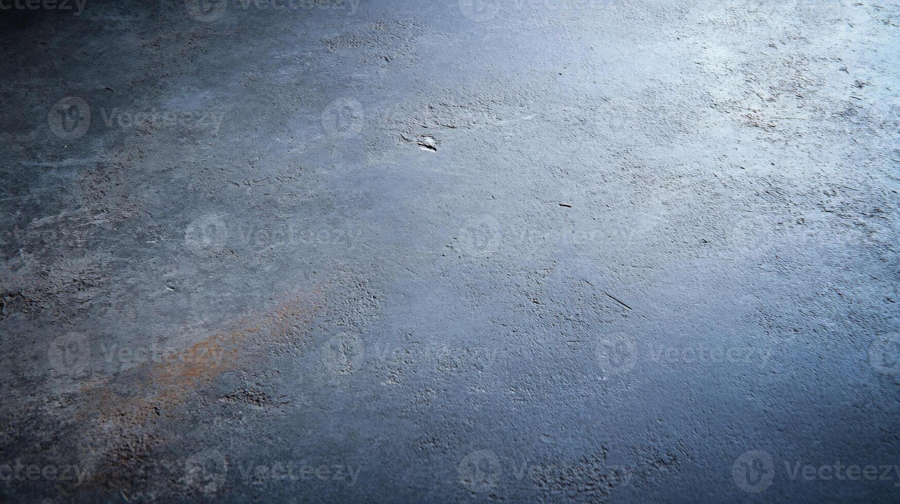 Dark gray textured surface with subtle light. photo