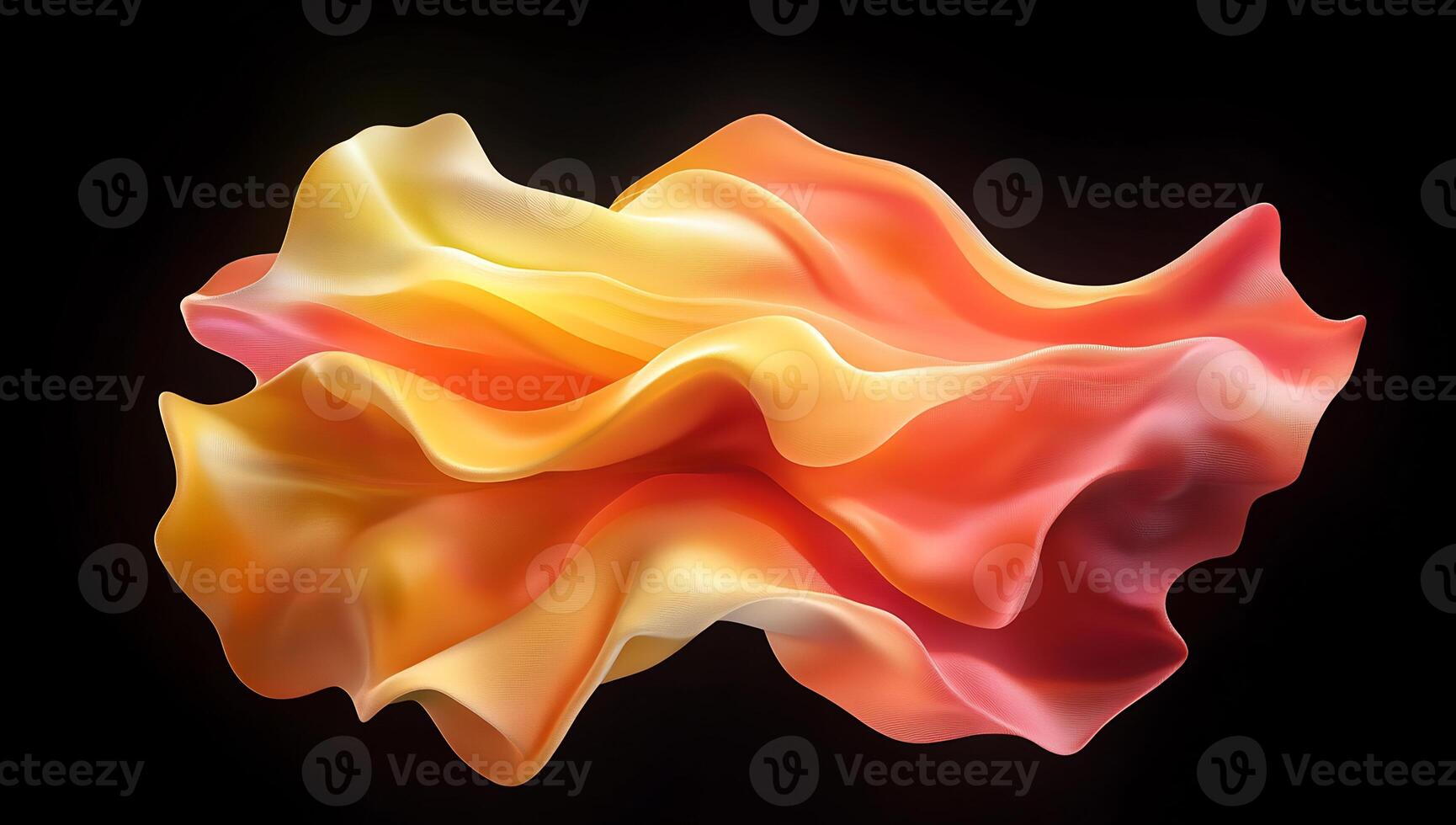 Abstract orange and yellow flowing fabric in dark background. photo