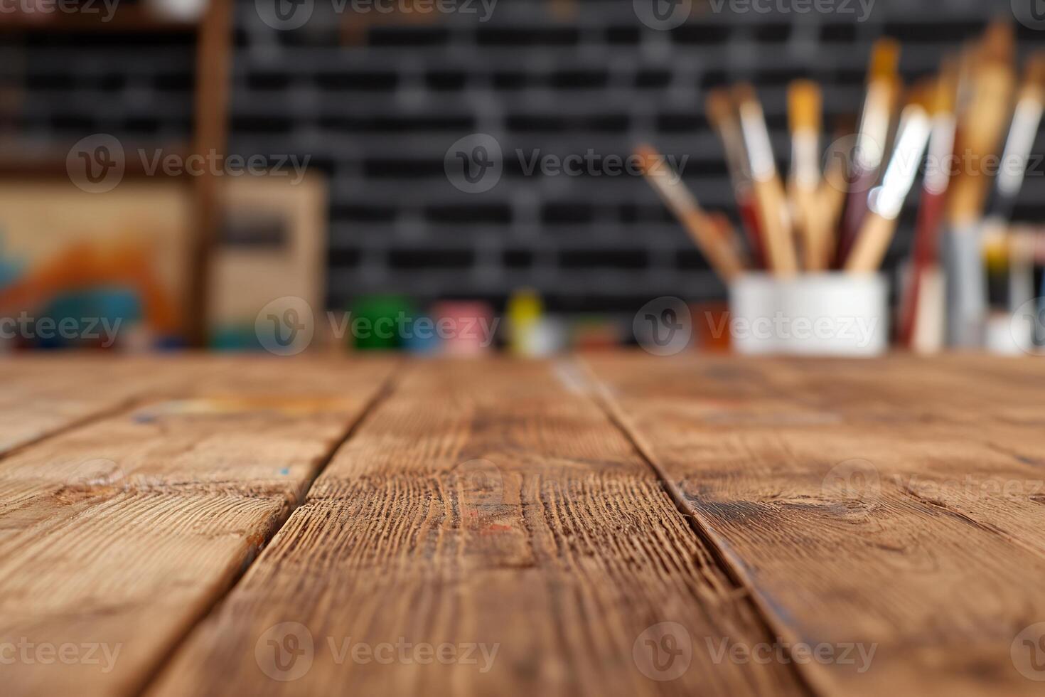 Rustic wooden table in artist's studio. photo