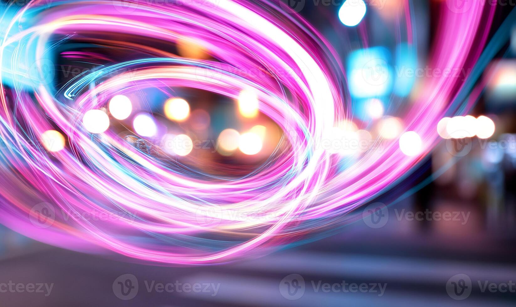 Abstract light trails swirl in city at night. photo