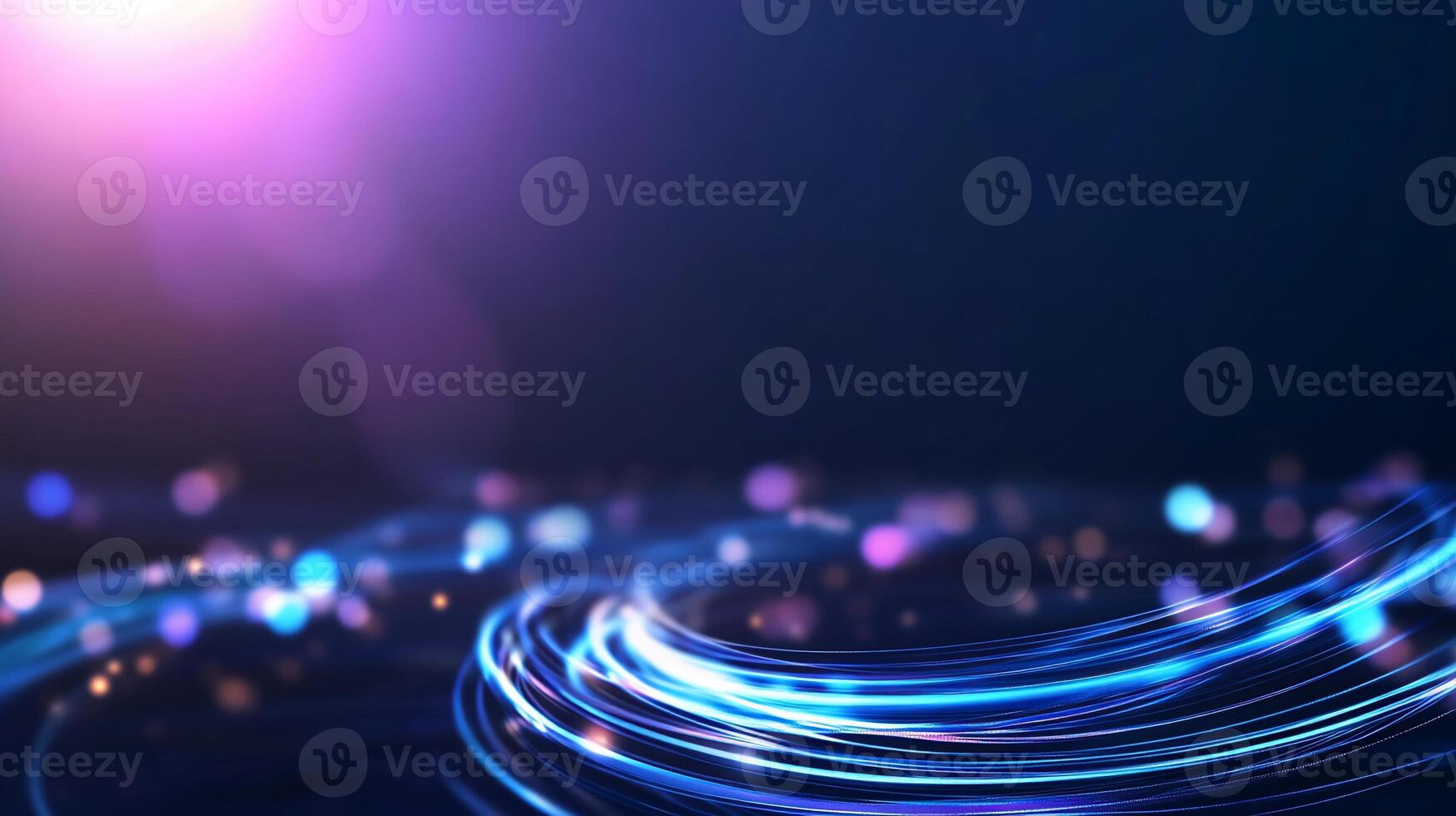 Abstract swirling neon light trails on dark background. photo
