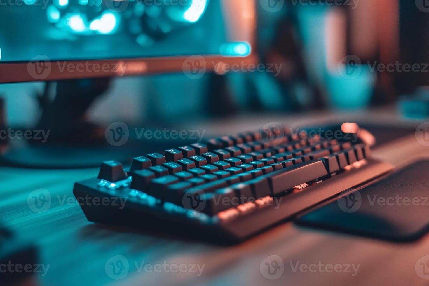 A keyboard and mouse on a desk photo