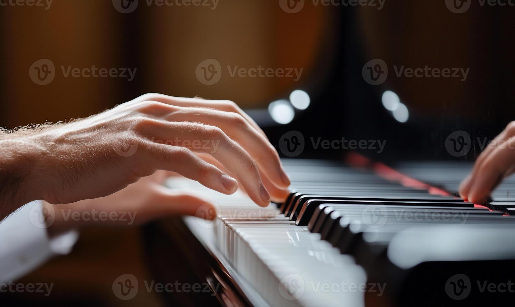 Hands playing the piano photo