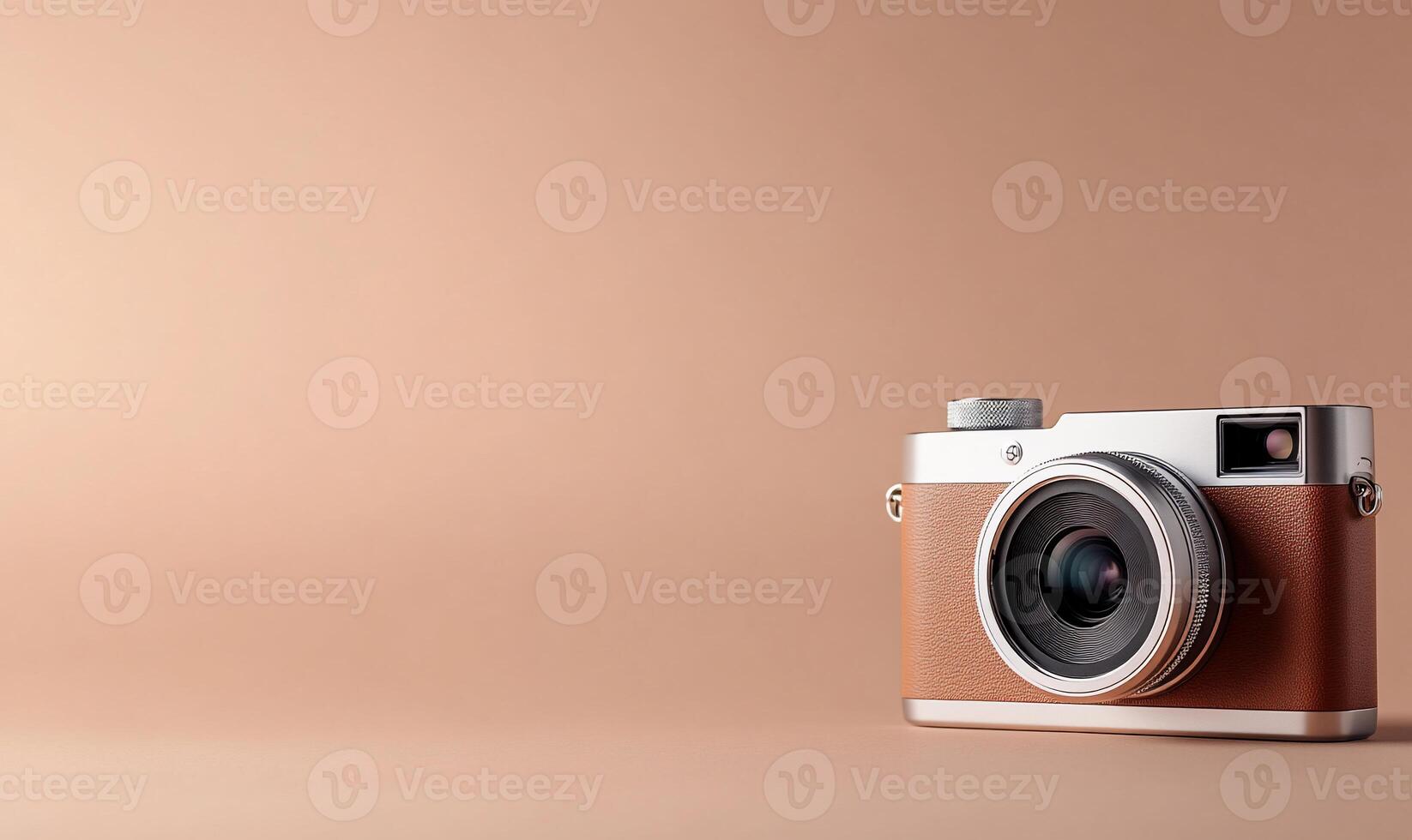 Retro camera on beige background. photo