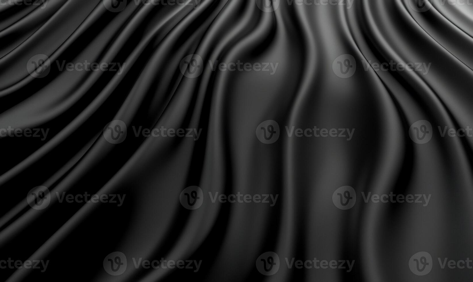 Abstract black fabric with elegant folds and waves. photo