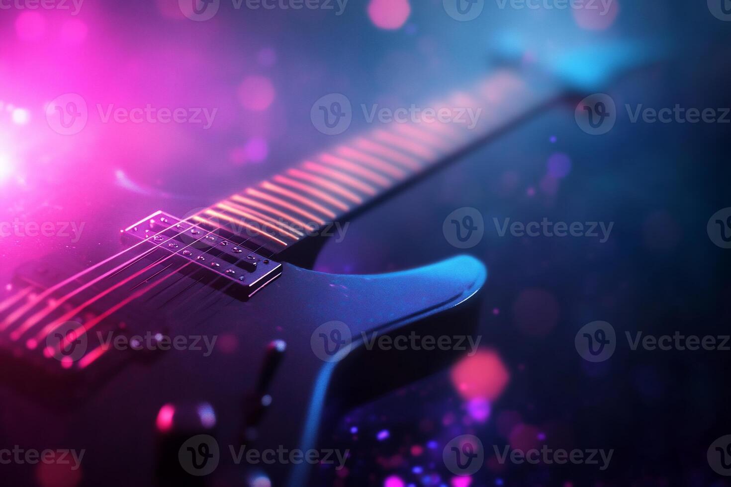 Electric guitar in vibrant neon light. guitar on neon light photo
