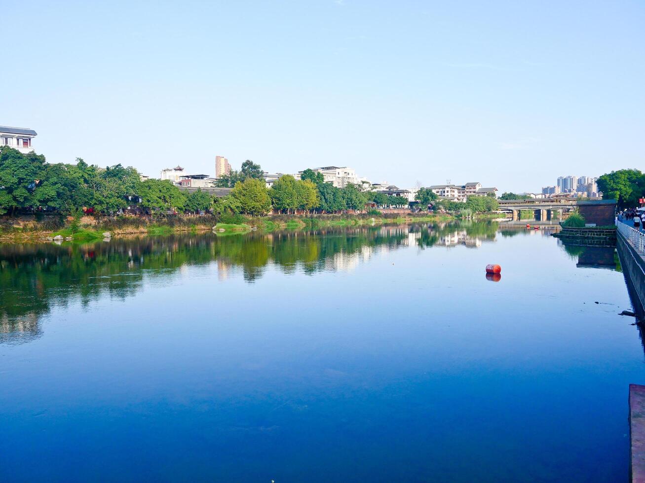 China, LeShan, 01.01.2025 beautiful RuGong river running through the old town of SuJi China photo