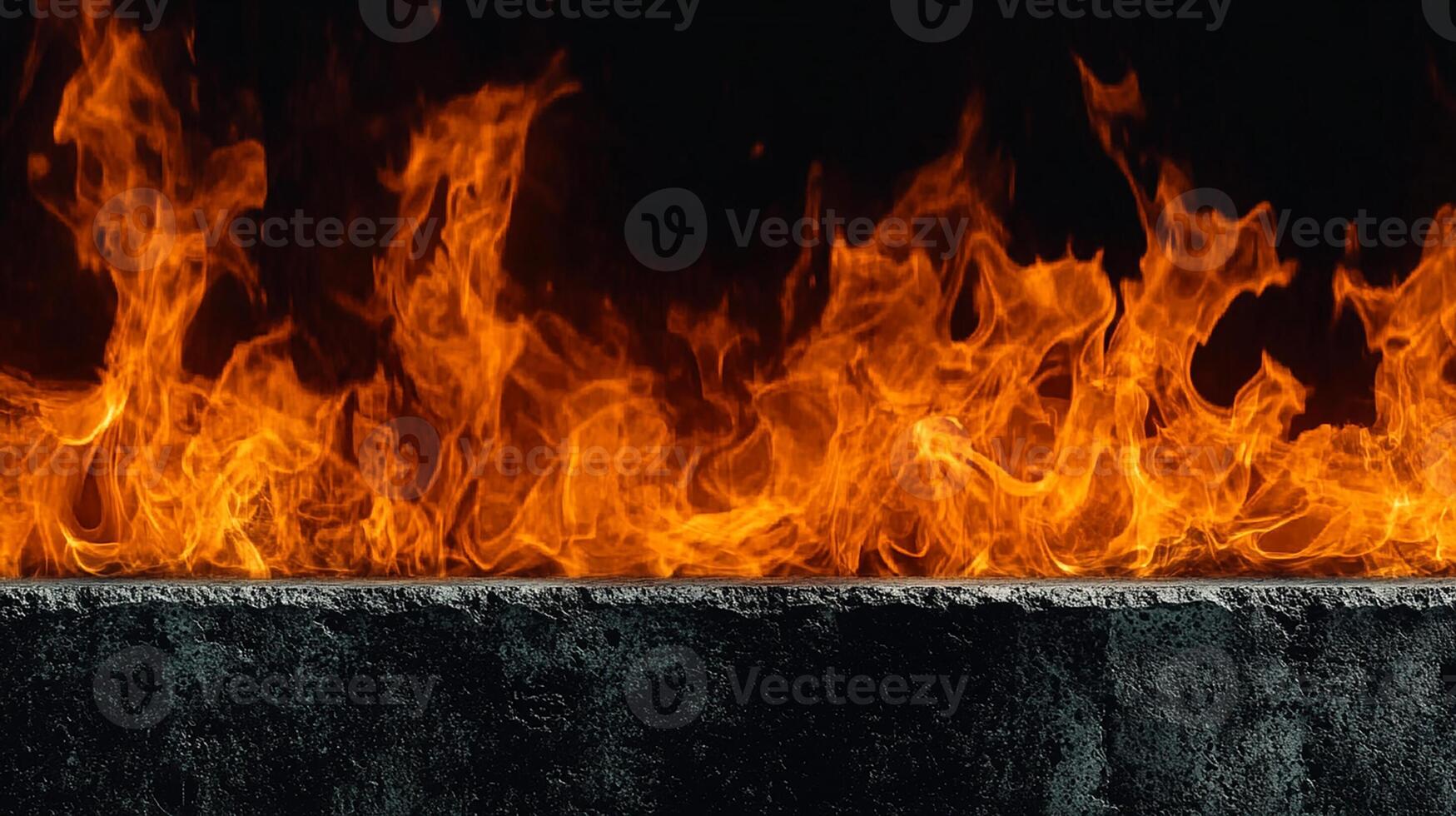 Intense Flames and Fire on a Dark Background photo