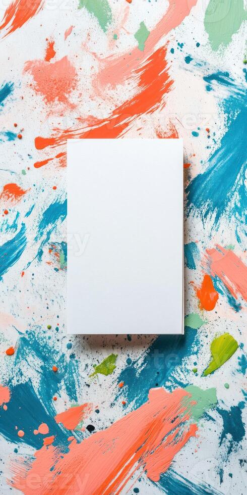 Delicate artistic flat lay of blank canvas with colorful brush strokes for creative design inspiration photo