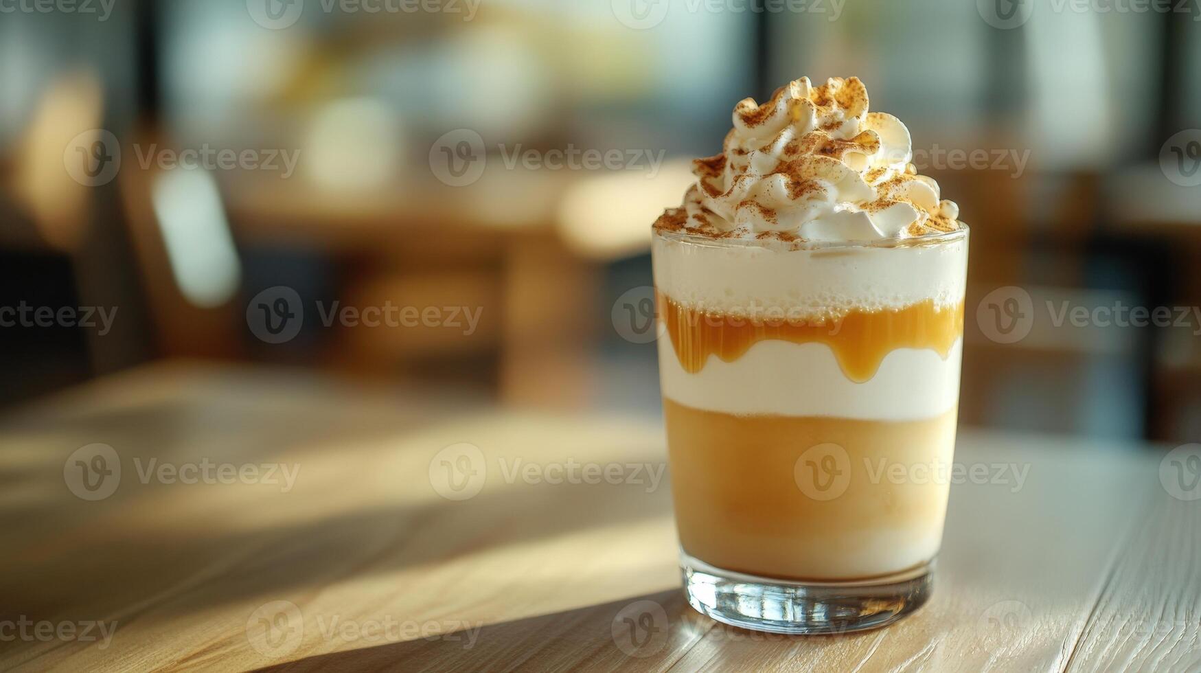A Delicious Layered Coffee Drink With Whipped Cream photo