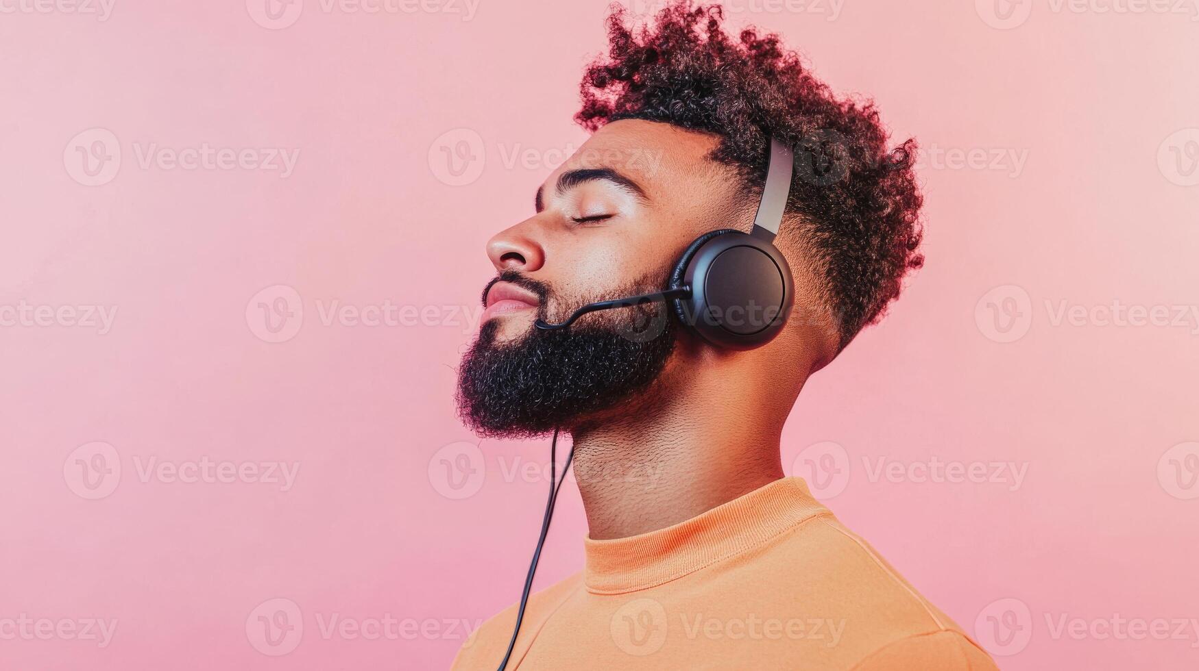 Man with headphones enjoys peaceful audio experience photo