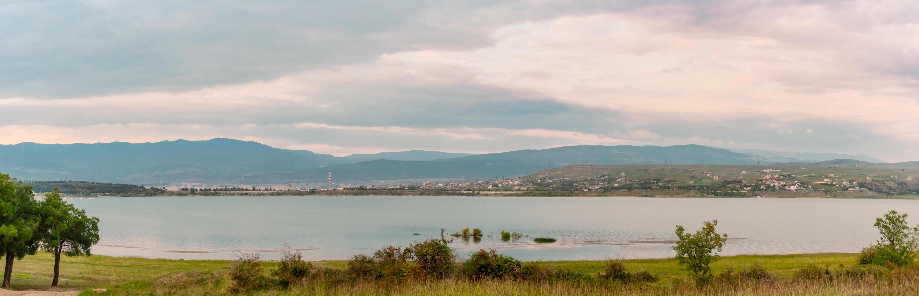 View of the lake in Tbilisi and the nature around it. Tbilisi Sea, lake in the city of Tbilisi, Georgia. photo