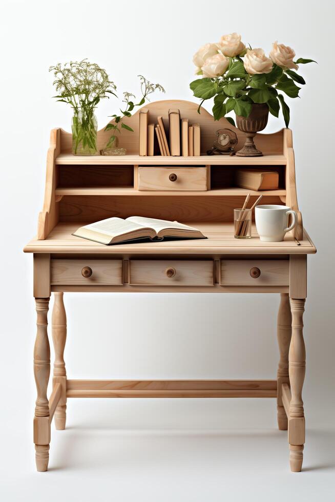 A desk with a book, flowers and a vase photo