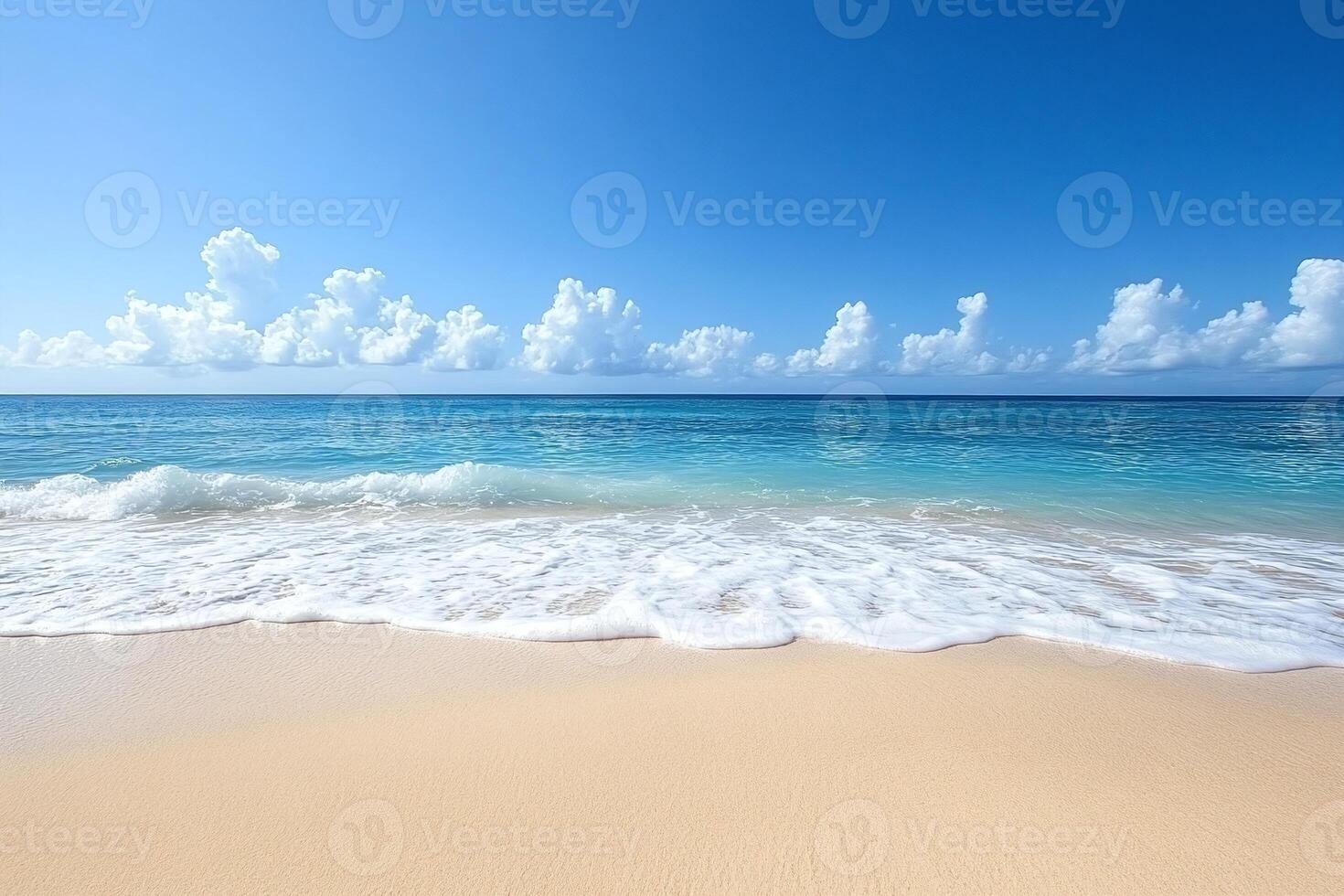 Tranquil Sandy Beach With Gentle Waves And Clear Blue Ocean Under Bright Blue Sky And Fluffy Clouds photo