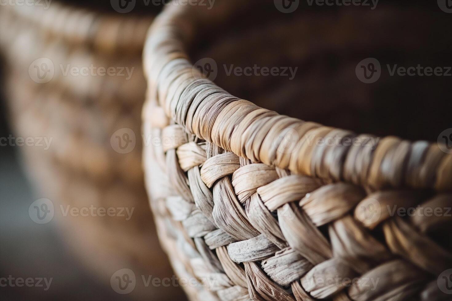 Closeup of Handwoven Natural Straw Basket with Textured Brown Beige Fibers in Soft Light photo