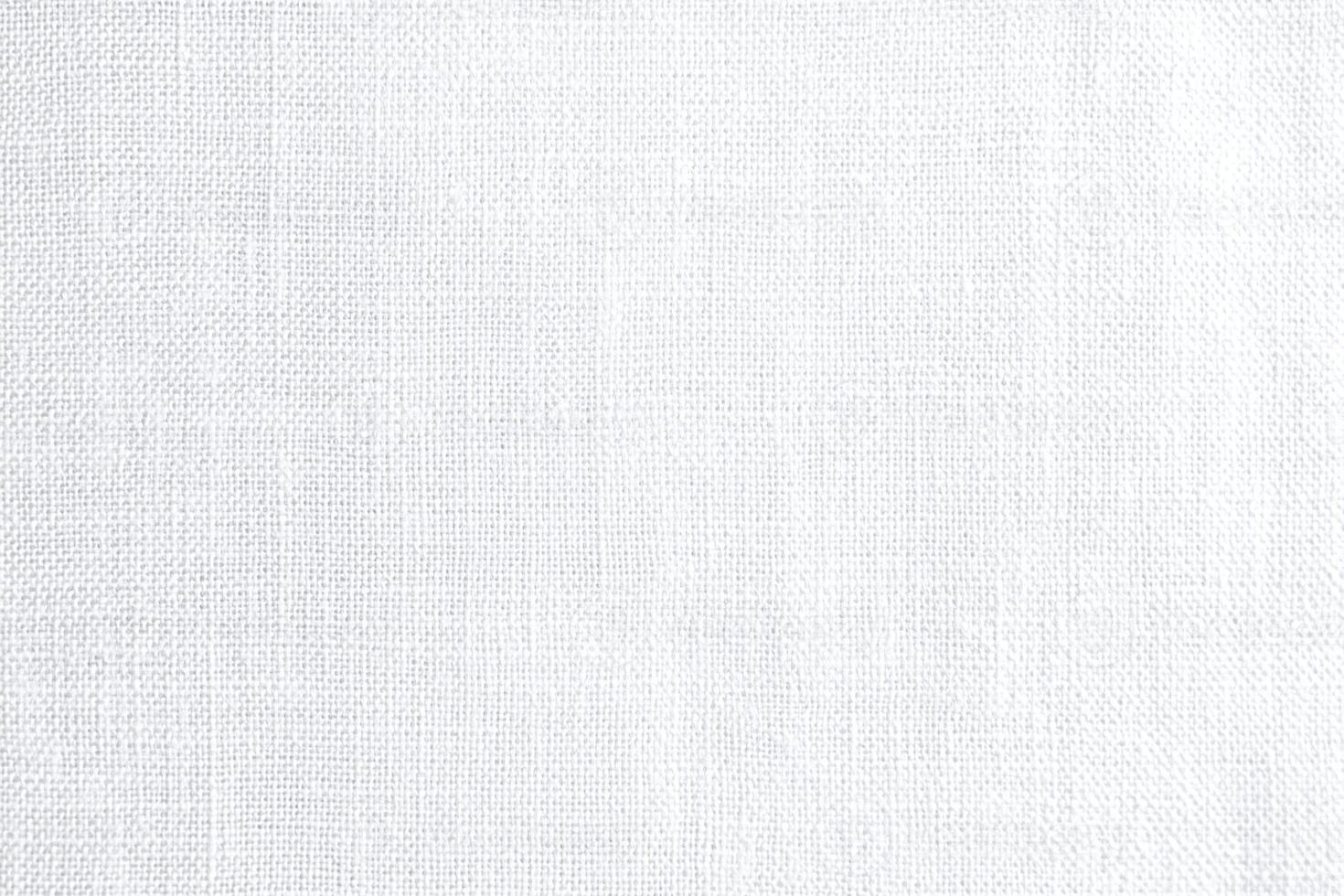 Closeup of White Linen Fabric Texture with Natural Woven Pattern for Textiles and Backdrops photo