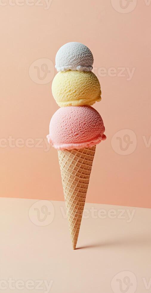 Triple Scoop Ice Cream Cone With Strawberry Vanilla Lemon Scoops On Beige Pink Background For Summer Dessert photo