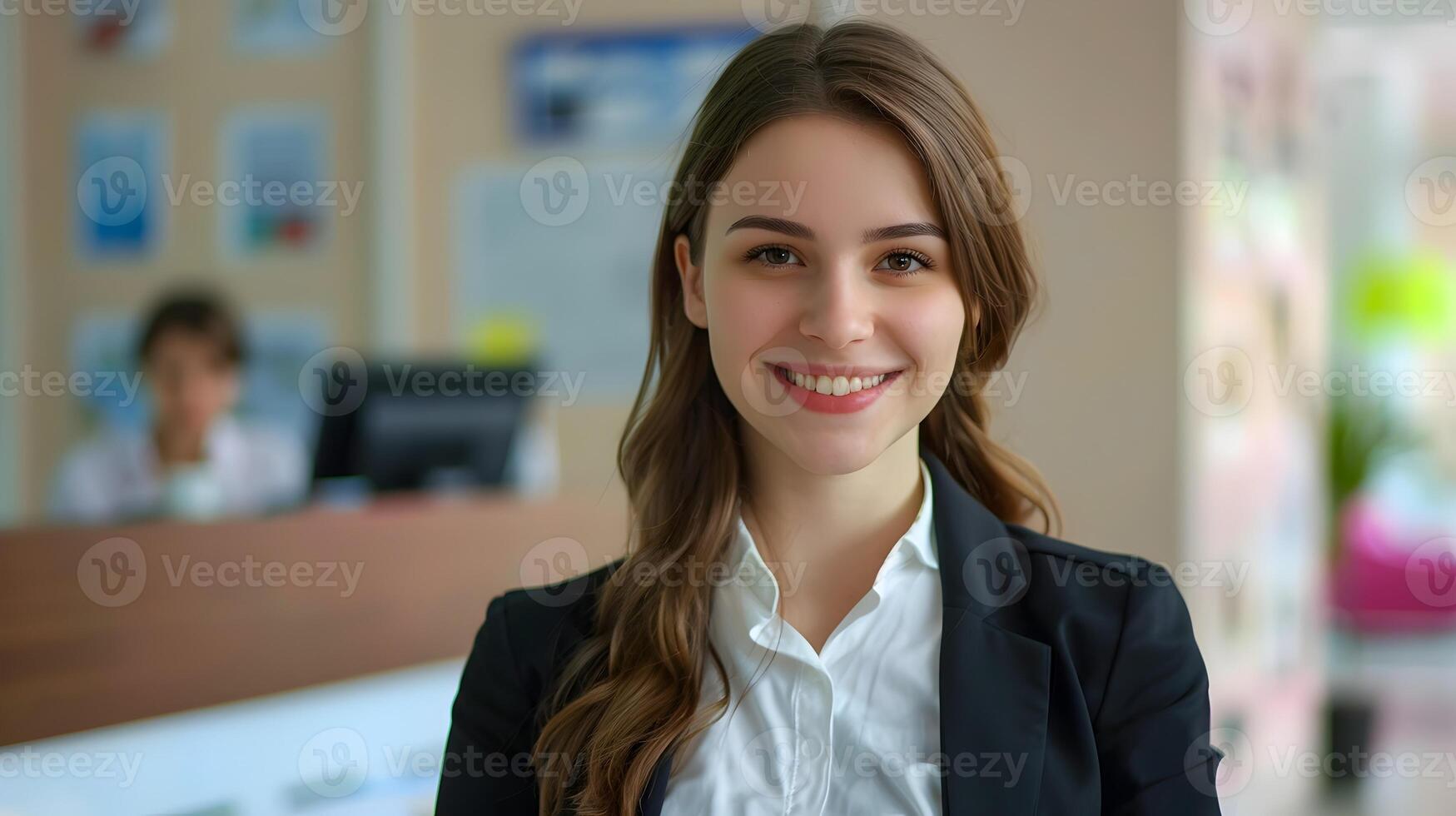 Happy Young Front Desk Manager Exuding Professionalism and Success in a Vibrant Workspace photo